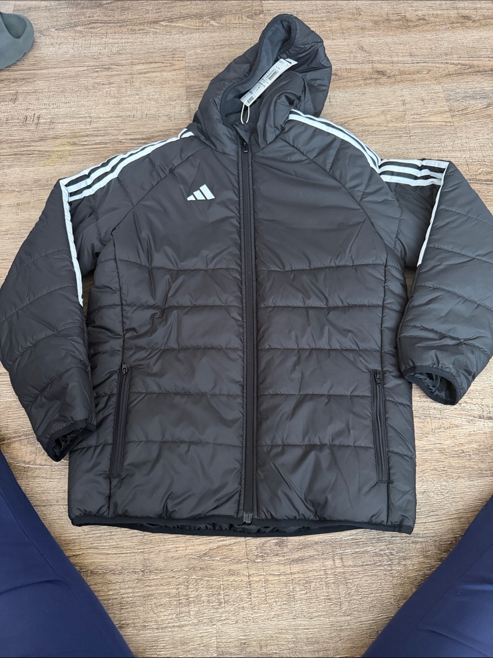 Brand new adidas Black Puffer Jacket with White Stripe Accents
